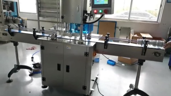 PET塑料罐全自（zì）動封罐（guàn）機